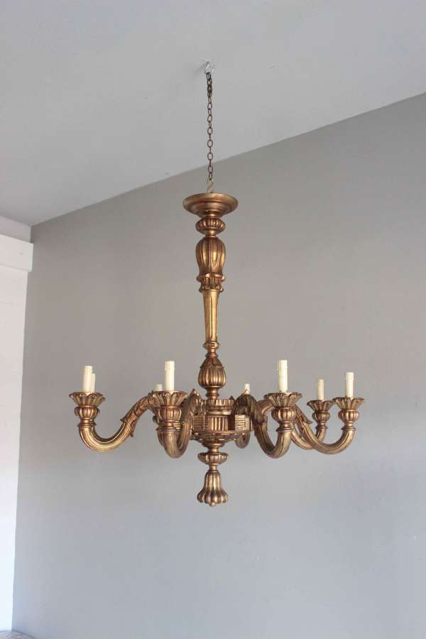 Grand scale mellow giltwood antique chandelier
