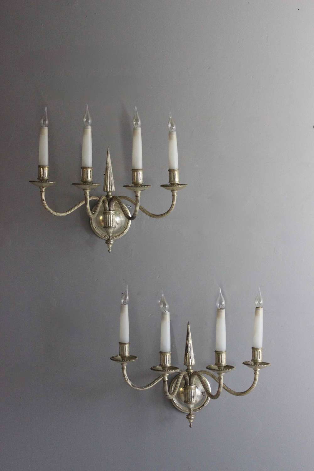 Beautiful well made pair of silver plated  4 branch wall lights