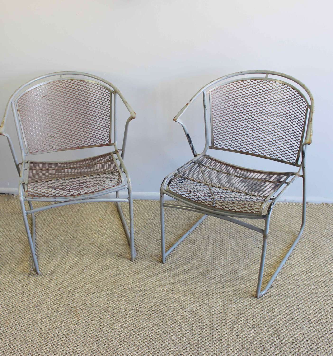 Pair of grey metal garden side chairs