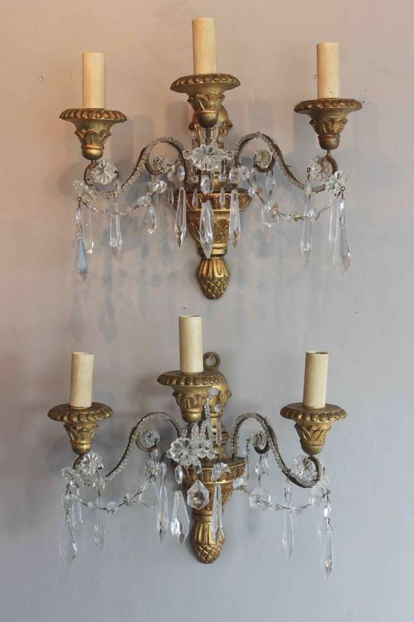 Pair of giltwood beaded three branch wall lights