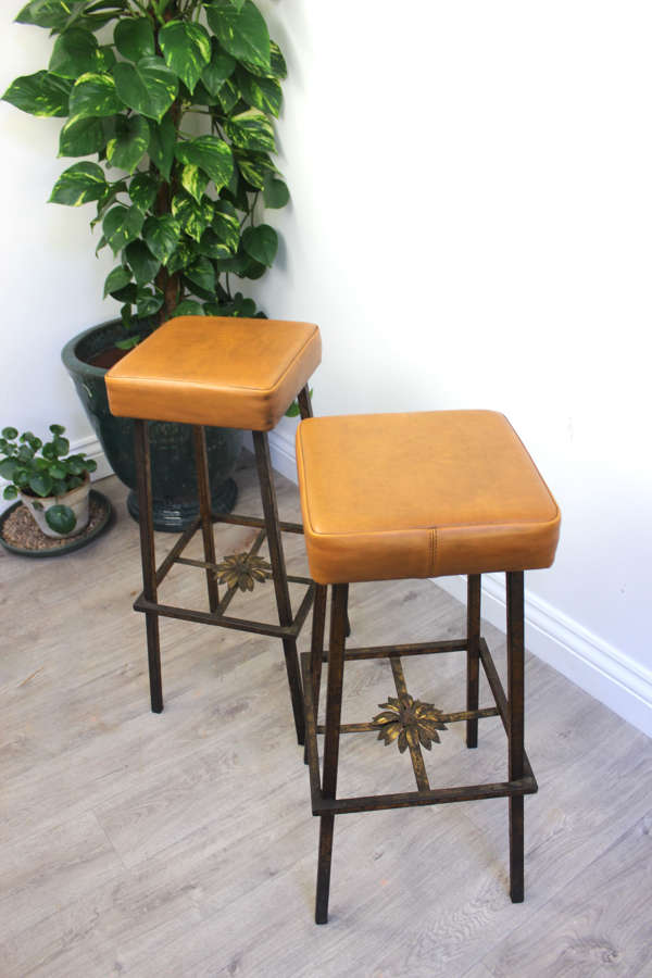 Pair of leather topped bar stools by Hermanos Vidal