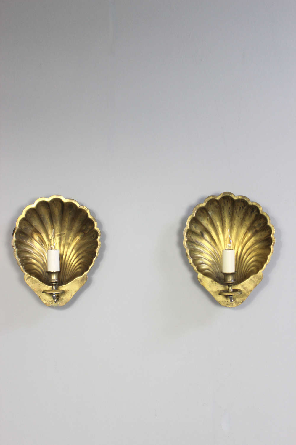 Fine  pair of substantial  shell brass wall lights