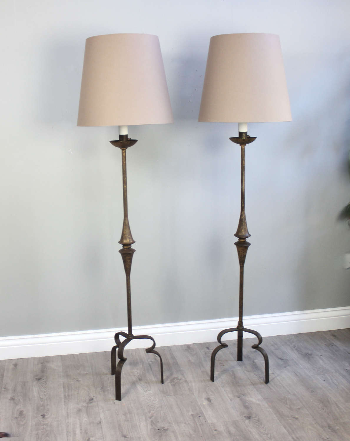 Two pairs of elegant Spanish floor lamps