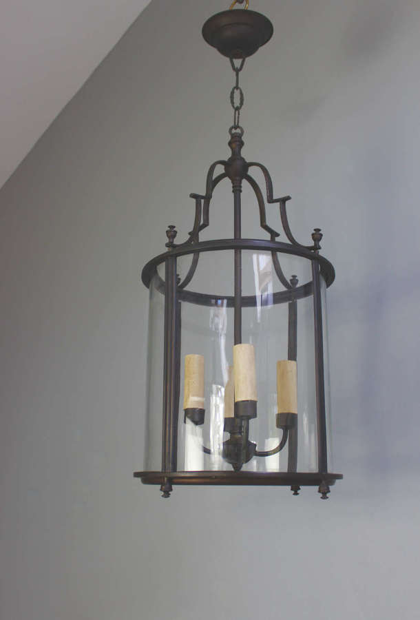 Elegant circular glass and brass framed entrance hall lantern